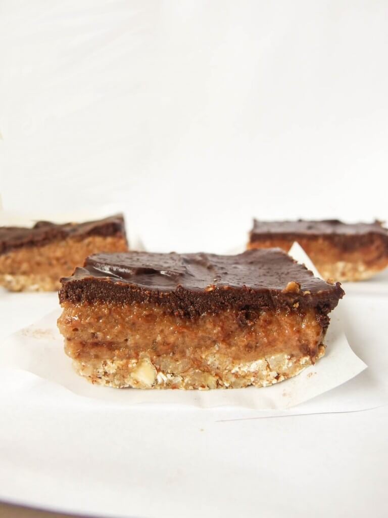 Three Sticky Vegan Date Caramel Mocha Bars with banana and coconut butter