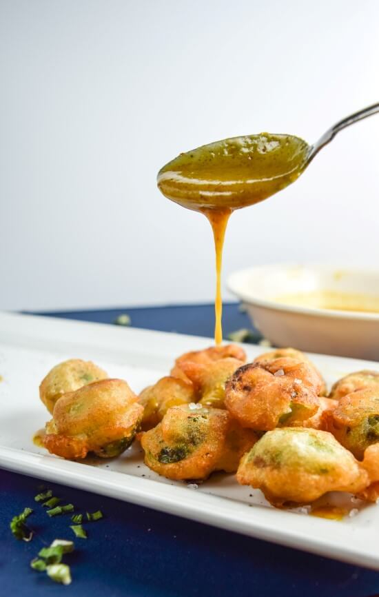 Nut and soy free crispy beer battered brussels sprouts with a drizzle of a smoky, sweet, and salty maple mustard sauce 