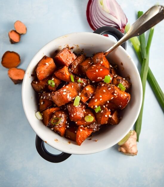 Cubed, oven roasted sweet potatoes with a from scratch teriyaki glaze make the perfect appetizer or side dish - or paired with rice and vegetables for a meal | yupitsvegan.com