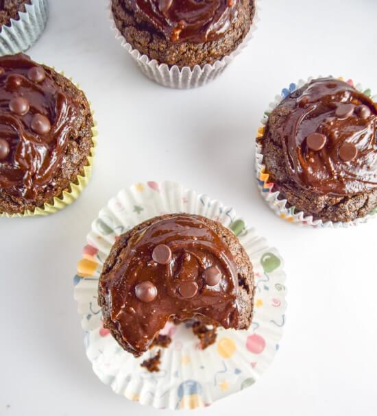 Sweet cupcakes with intense chocolate flavor, creamy avocado puree, rich nut butter ganache or fluffy light buttercream, and enjoy life chocolate chips. A perfect healthy dessert for a plant based sweet tooth!