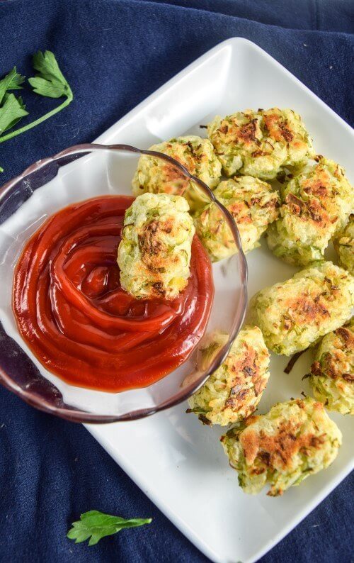 Shredded brussels sprouts and baked russet potatos make satisfying crispy, healthy tots paired with a ketchup and mustard dipping sauce