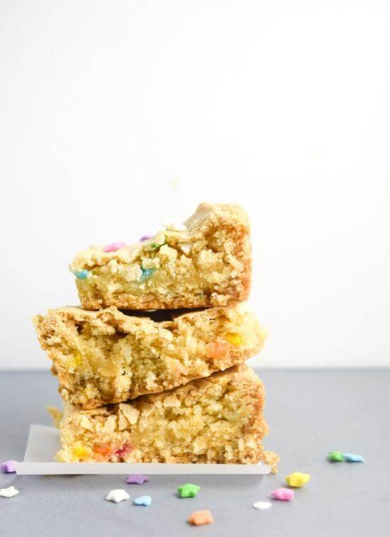 Vegan Cake Batter Blondies | yupitsvegan.com. Sinfully delicious, chewy on the inside, crispy on the edges, these totally VEGAN cake batter blondies are an easy treat that tastes exactly like funfetti batter!