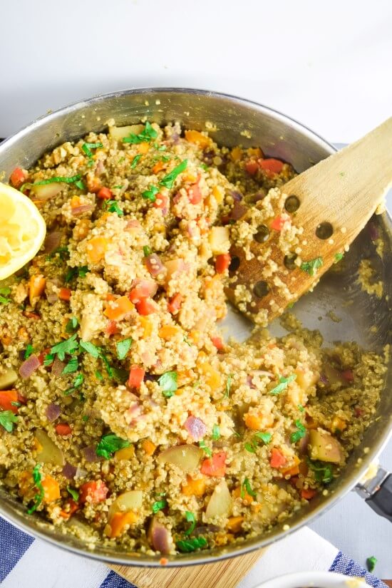 Vegan, soy and gluten free one pot quinoa dinner with a homemade moroccan spice blend of fennel, coriander, and allspice, paired with fresh vegetables, red lentils, and a lemon zest