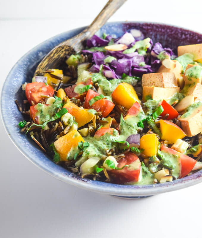 Wild Rice Salad with Creamy Basil Vinaigrette | Yup, it's Vegan. Summer-in-a-bowl salad packed with veggies, tofu, and a swoonworthy basil dressing.