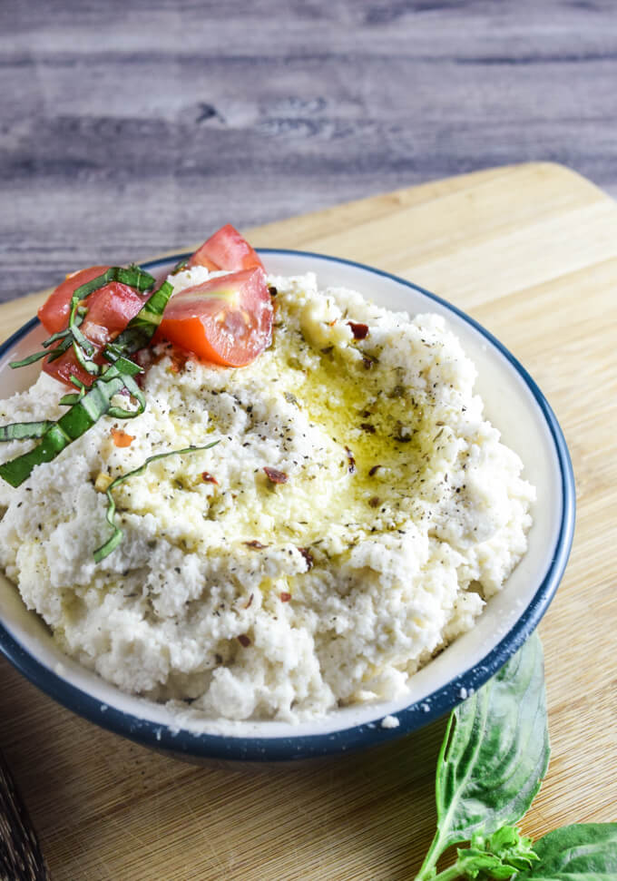 Almond Ricotta | Yup, it's Vegan. Easy 2-ingredient vegan ricotta (plus water and salt) with juicy red tomatoes, basil chiffonade, and olive oil