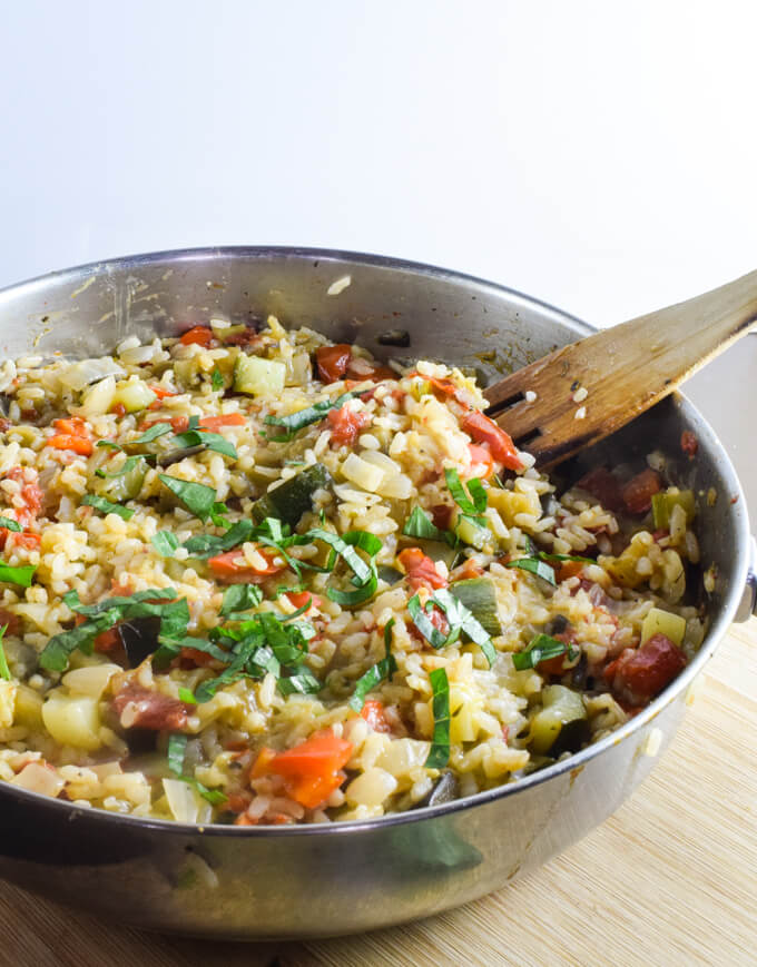 Fluffy white vegan rice cooked with fresh eggplant, juicy tomatoes, crunchy red bell pepper, and rich summer squash for the perfect easy meal | Yup, it's Vegan