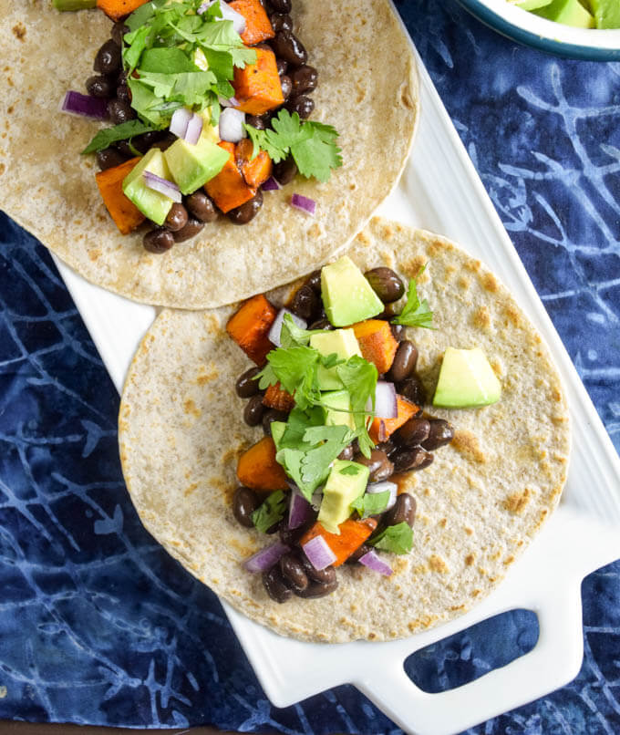 BBQ Sweet Potato Black Bean Tacos | yupitsvegan.com. Satisfying but light tacos that are made with normal grocery store ingredients and perfect for cold weather!