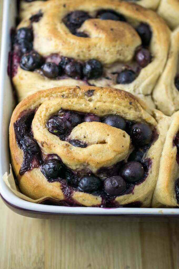 Close-up of one vegan blueberry sweet roll with no glaze.