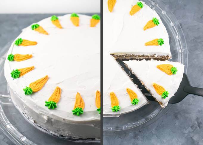 Overhead view showing the decorative royal icing "carrots" on a whole vegan carrot cake, with a slice being cut out of the right side.