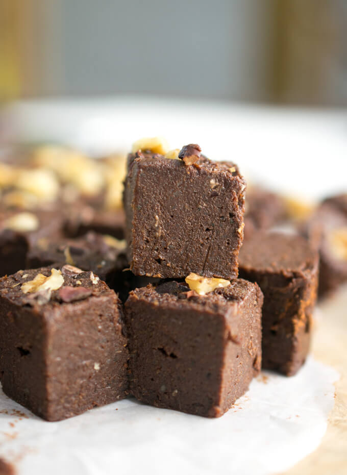 Close-up shot of a slice of chocolate freezer fudge, showing a smooth and creamy interior texture